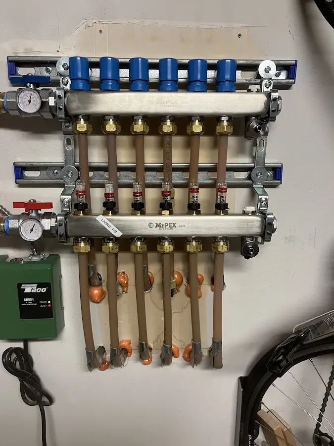 Plumber performing Water Heater Repair at a residential property in Kimberly